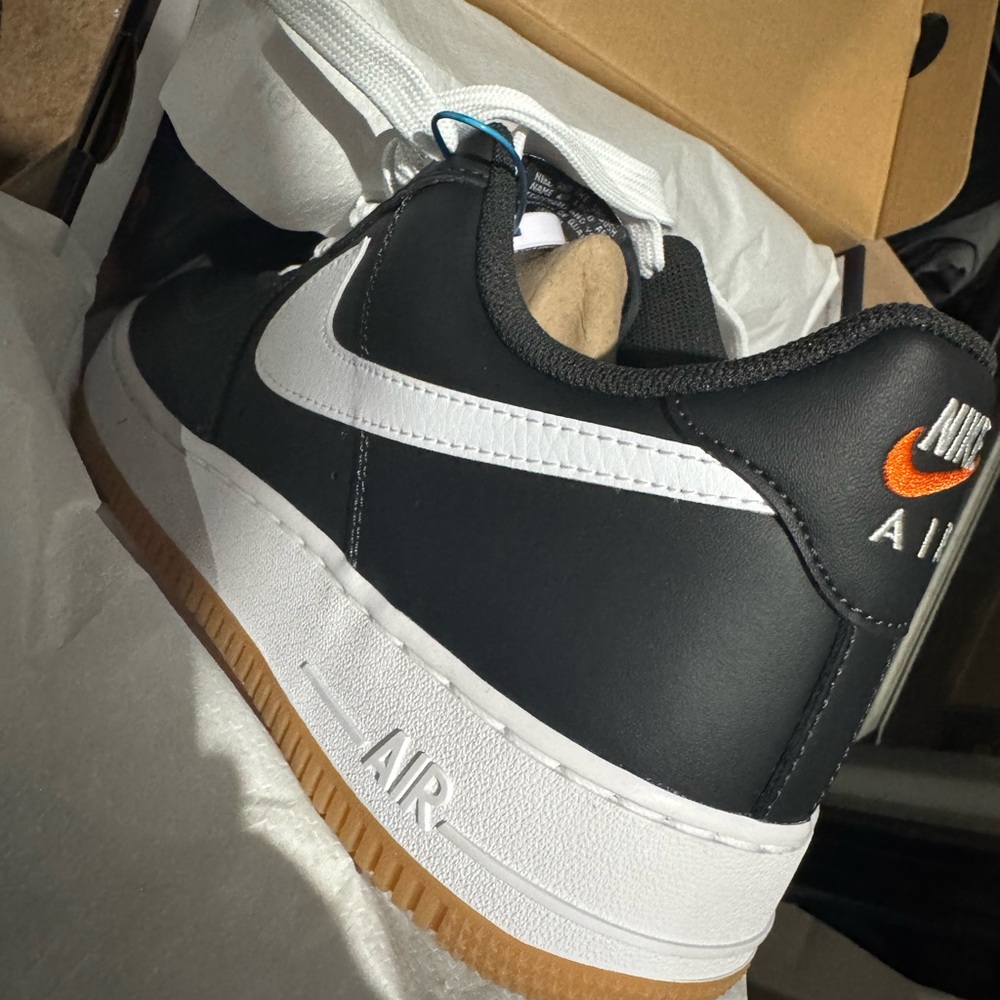 Nike Men’s Black and White Sneakers with Orange Accents